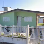 LOTE 000 - O imóvel, em alvenaria, com área total de 148,77m², localizado na Rua Carlos Cazaletti Filho, nº 1102, Balneário Pinhal/RS