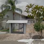 LOTE 018 - O imóvel na Rua Minuano nº 880, sendo um terreno com um prédio residencial, em alvenaria, sob a numeração 880, com o respectivo terreno situado no bairro Liberdade